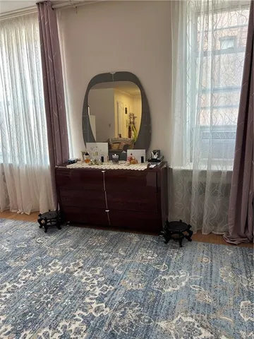 a room with a dresser