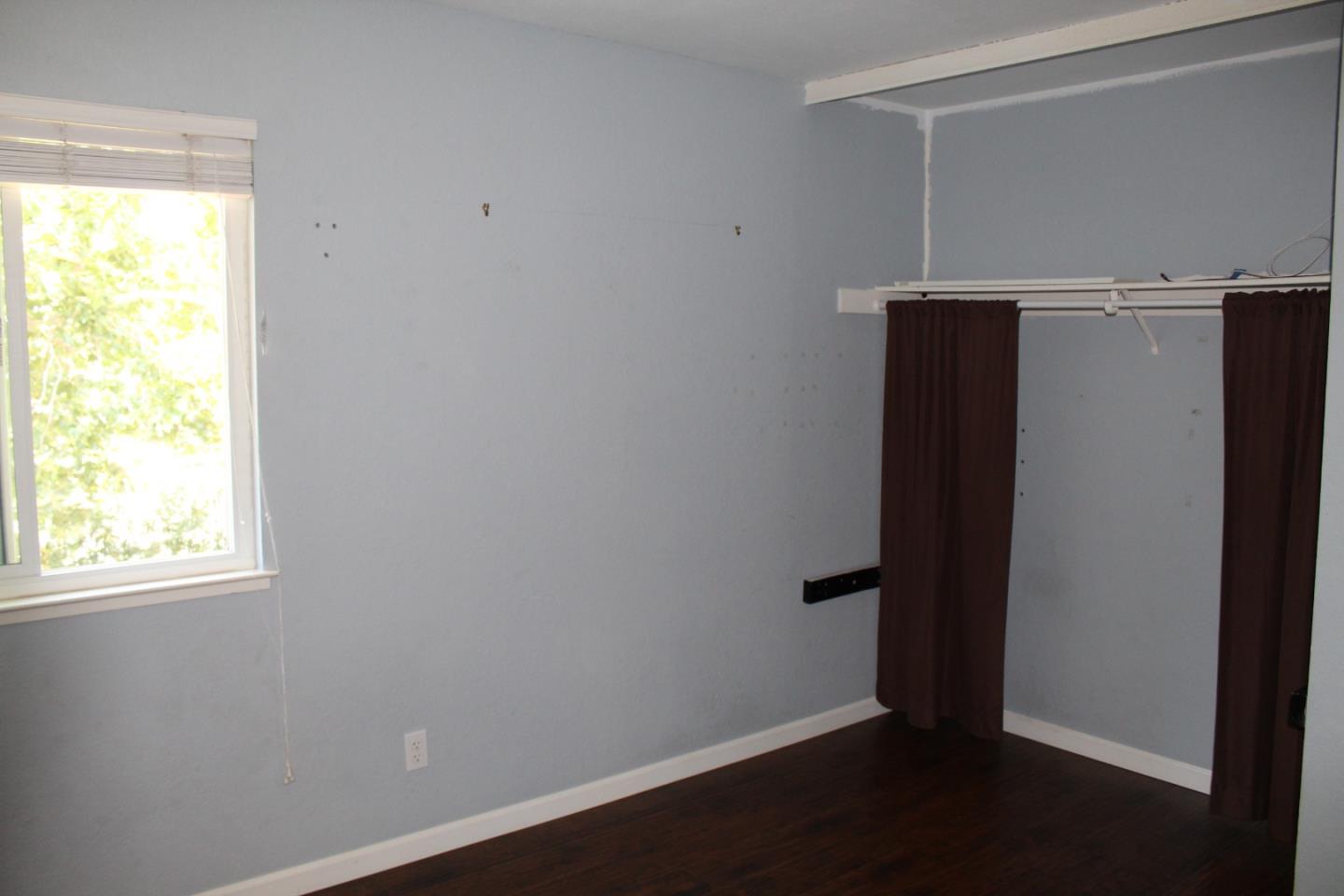 1025 Fillippelli Drive Gilroy, CA 95020 - Photo 20 of 47 an empty room with a door