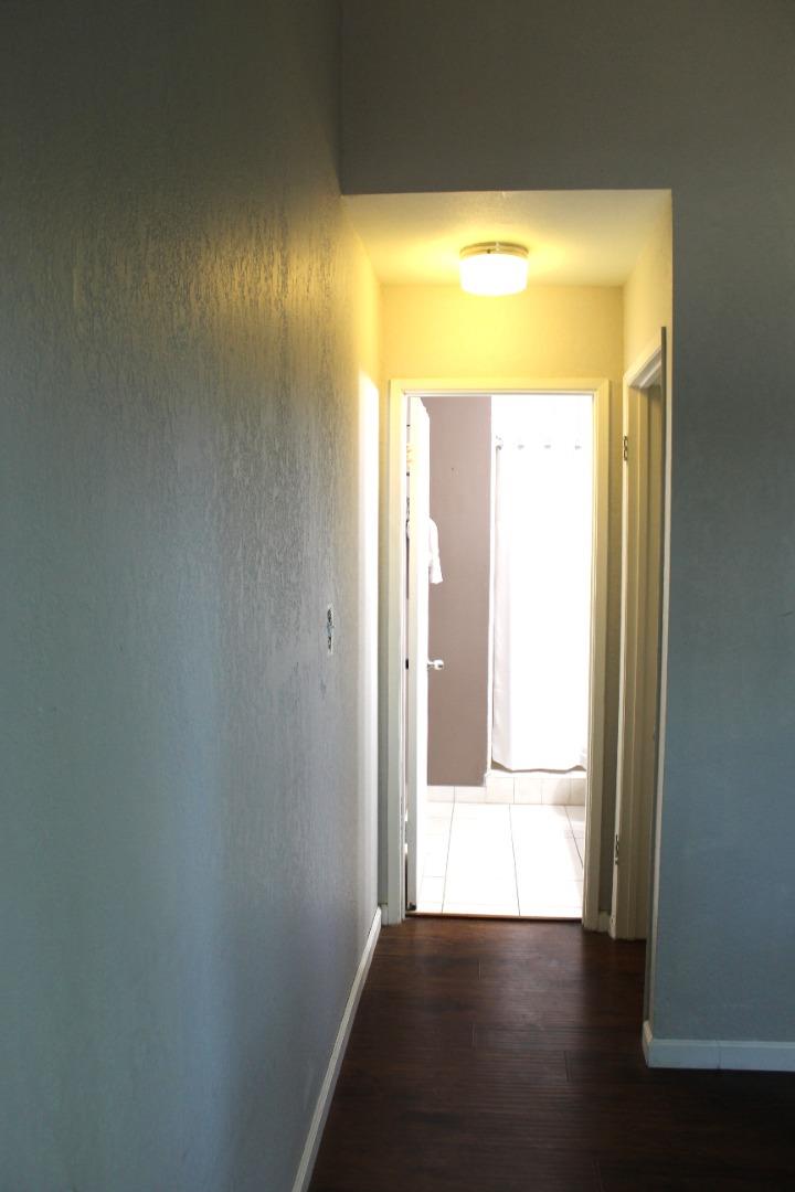 1025 Fillippelli Drive Gilroy, CA 95020 - Photo 26 of 47 a view of a bathroom with a glass door