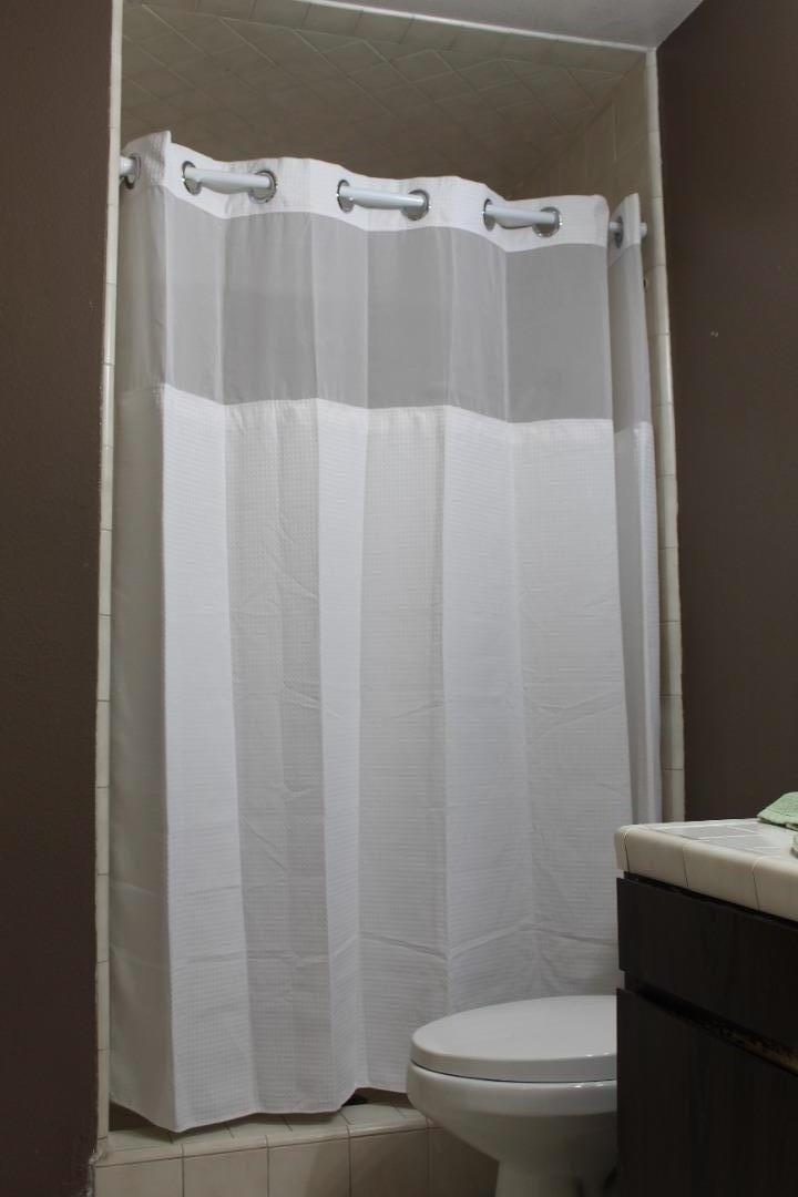 1025 Fillippelli Drive Gilroy, CA 95020 - Photo 29 of 47 a bathroom with a toilet and a shower