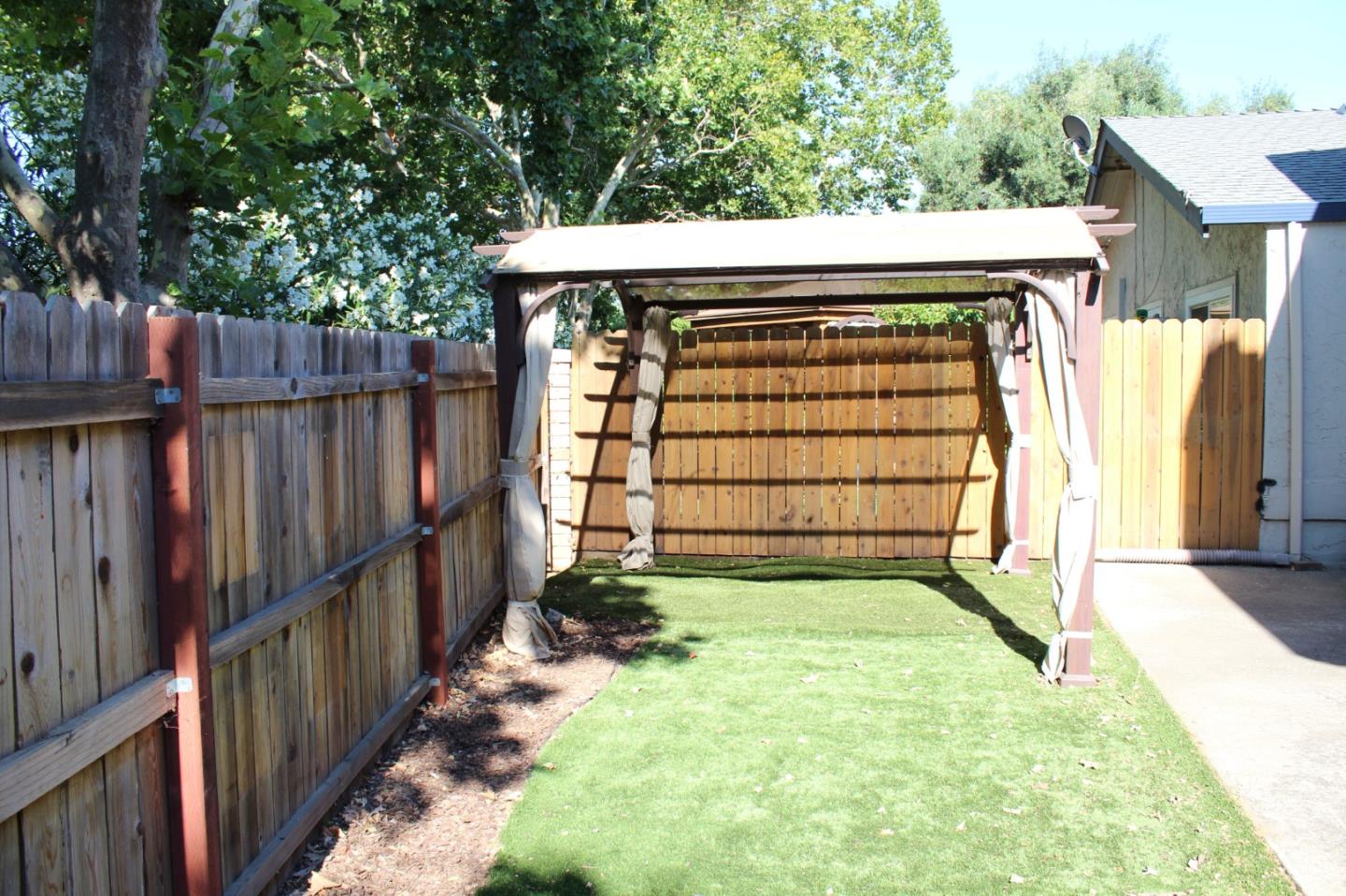 1025 Fillippelli Drive Gilroy, CA 95020 - Photo 37 of 47 a view of a small pool with wooden fence
