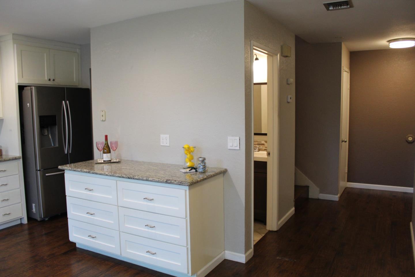 1025 Fillippelli Drive Gilroy, CA 95020 - Photo 10 of 47 a bathroom with a granite countertop sink and a mirror