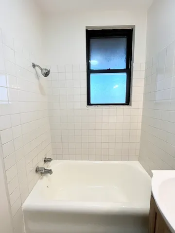a bathroom with a bathtub