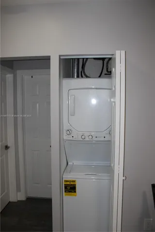 a bathroom with a shower and a door