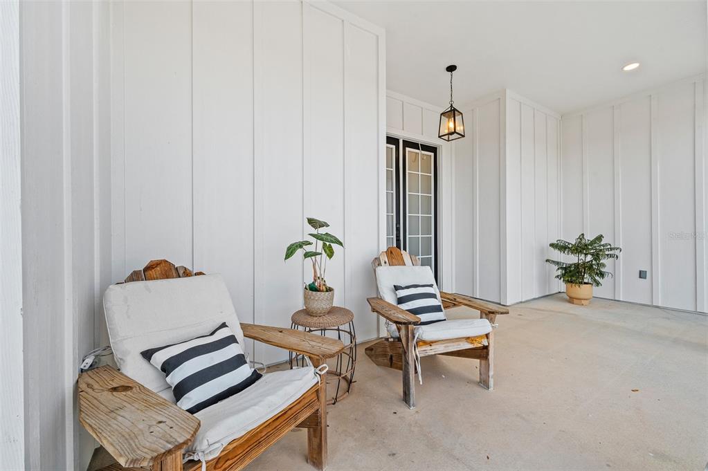 1068 Southwest 120th Drive Gainesville, FL 32607 - Photo 3 of 43 a living room with furniture and wooden floor