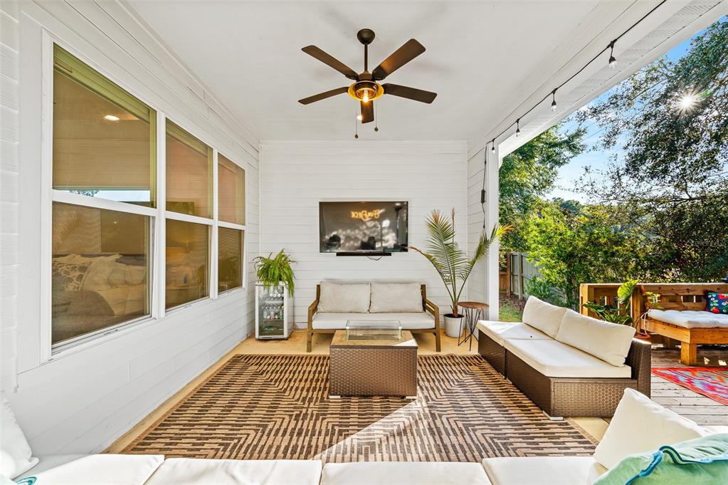 1068 Southwest 120th Drive Gainesville, FL 32607 - Photo 37 of 43 a view of a work space with wooden floor and a rug