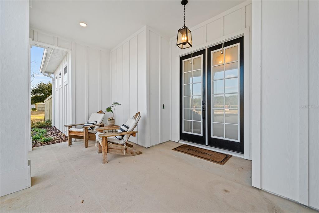 1068 Southwest 120th Drive Gainesville, FL 32607 - Photo 4 of 43 a view of a livingroom with furniture and floor to ceiling window