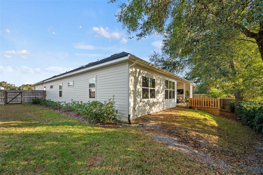 1068 Southwest 120th Drive Gainesville, FL 32607 - Photo 43 of 43 a view of a yard in front of house