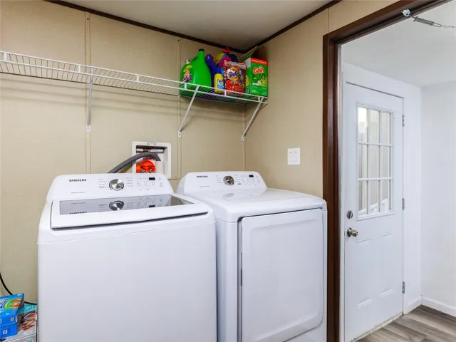 a utility room with dryer and washer