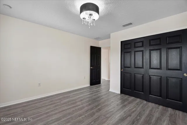 a view of a backyard with garden