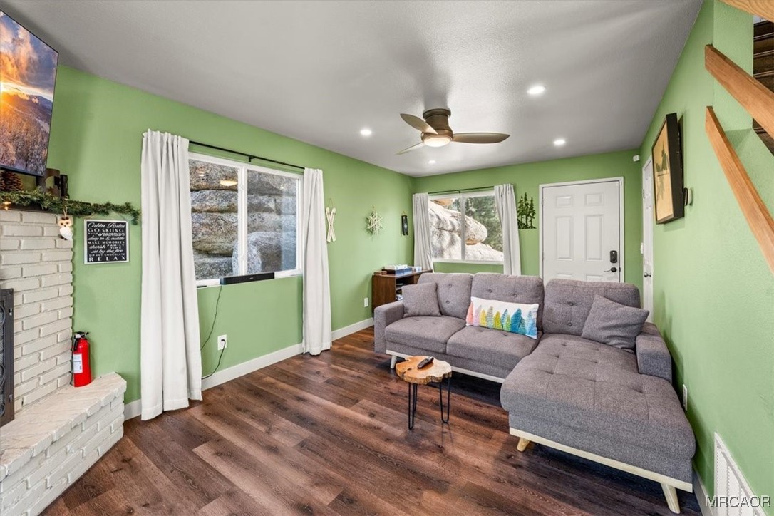 33334 Bear Road Running Springs, CA 92382 - Photo 17 of 37 a living room with furniture and a wooden floor