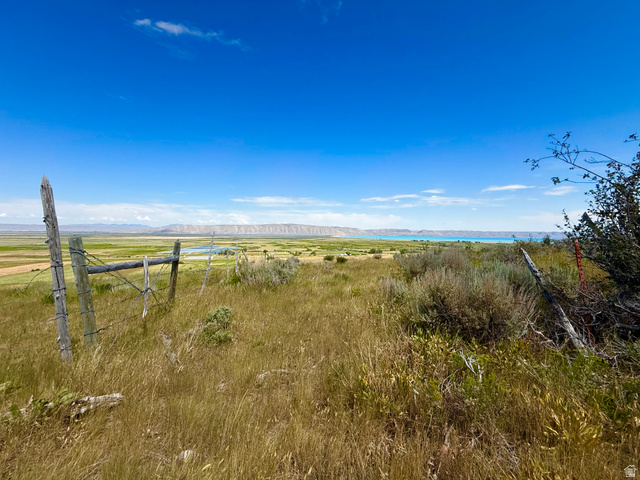 160 Dry Canyon St. Charles, ID 83272 - Photo 6 of 63 Expansive landscape featuring distant mountains, a body of water, and a clear blue sky