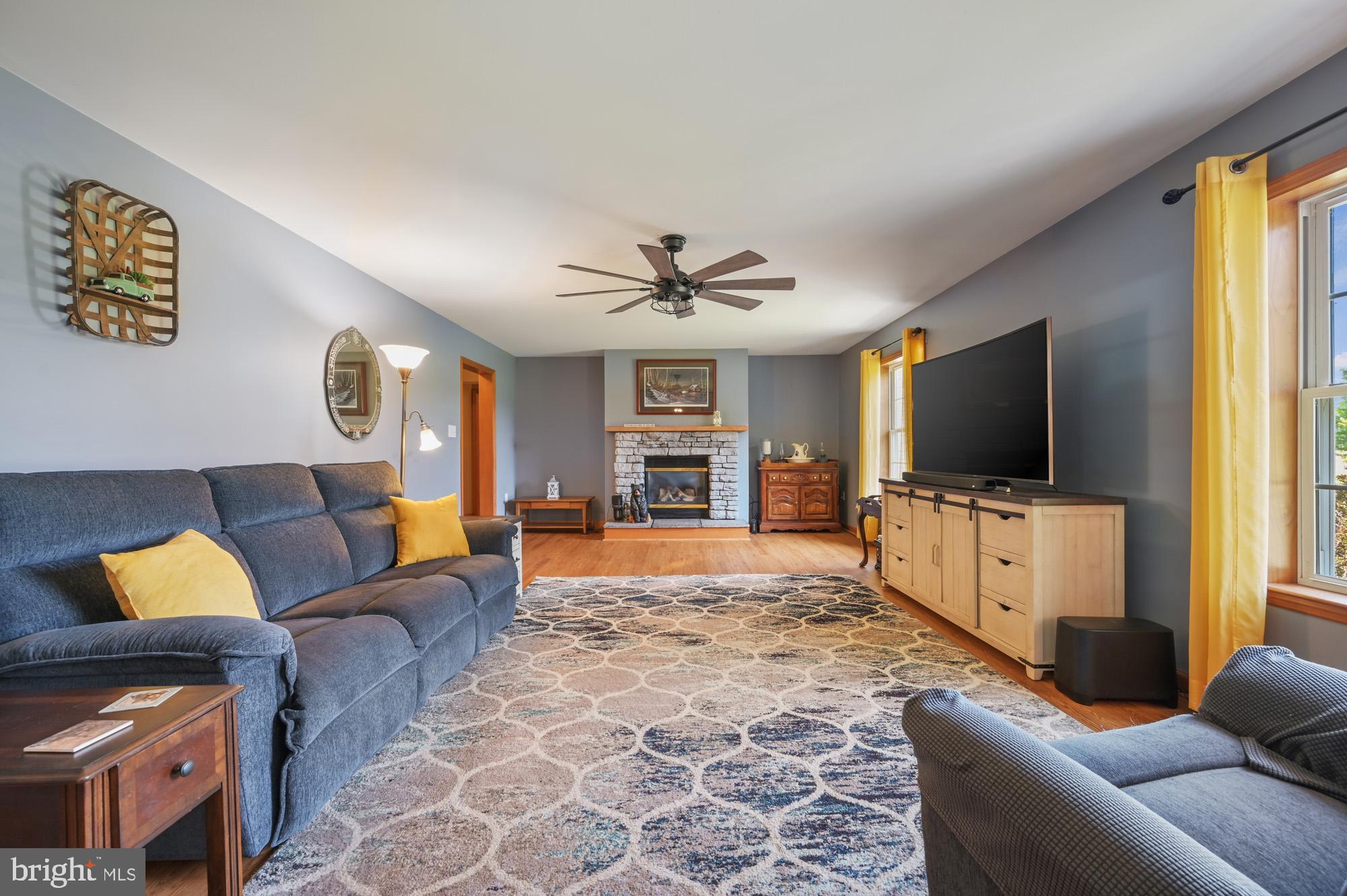 480 Hemping Road Harrington, DE 19952 - Photo 15 of 40 a living room with furniture and a flat screen tv