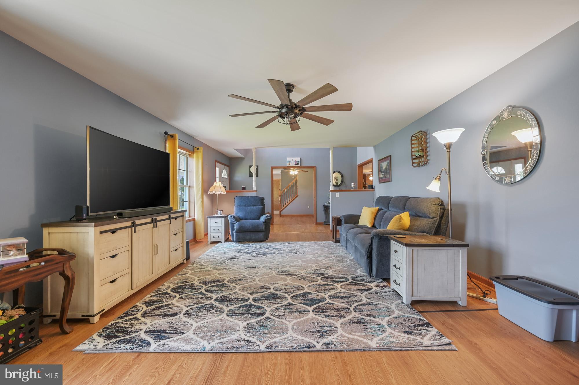 480 Hemping Road Harrington, DE 19952 - Photo 16 of 40 a living room with furniture and a flat screen tv