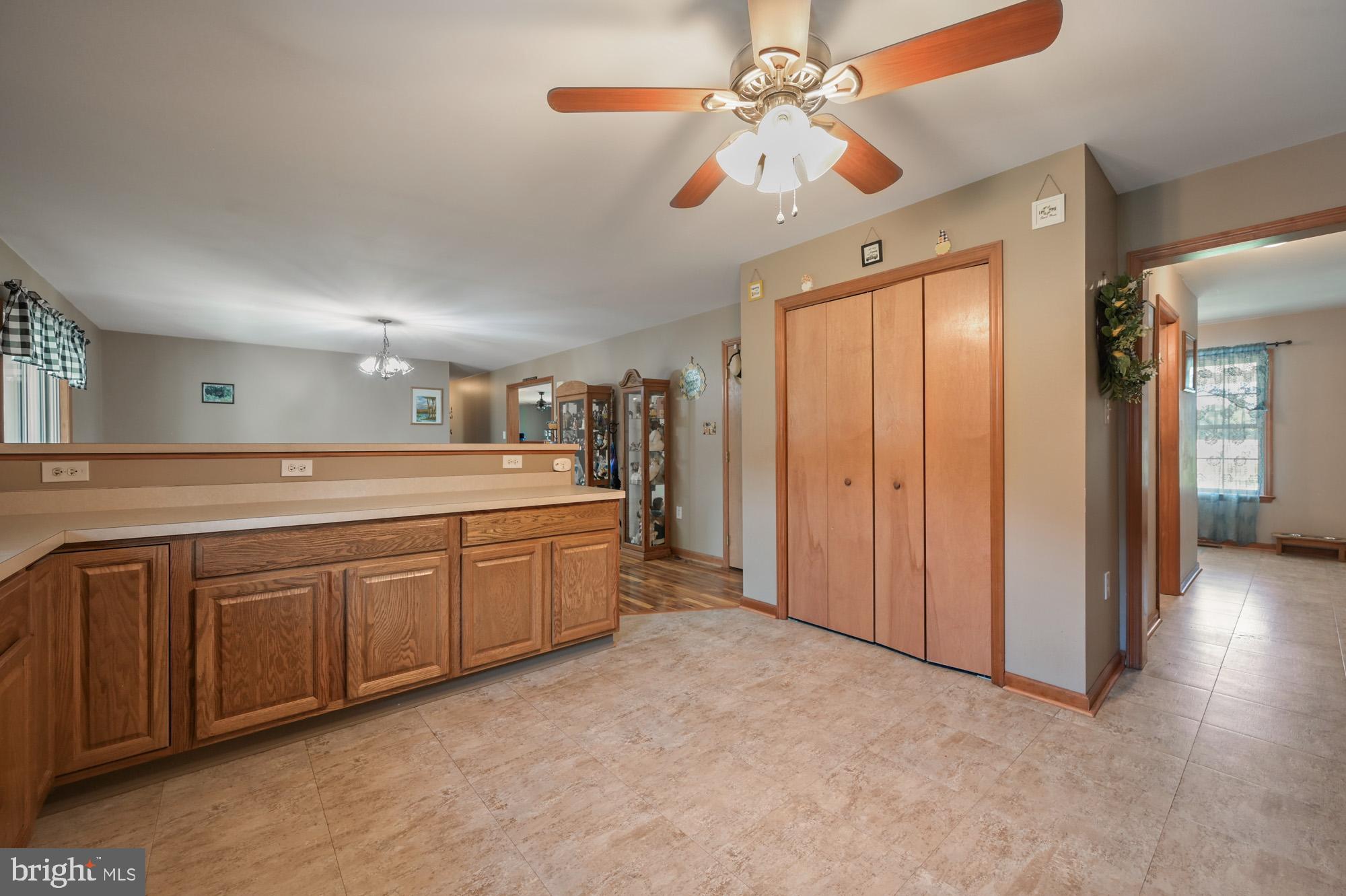 480 Hemping Road Harrington, DE 19952 - Photo 20 of 40 a large kitchen with a sink and dishwasher a refrigerator with wooden floor