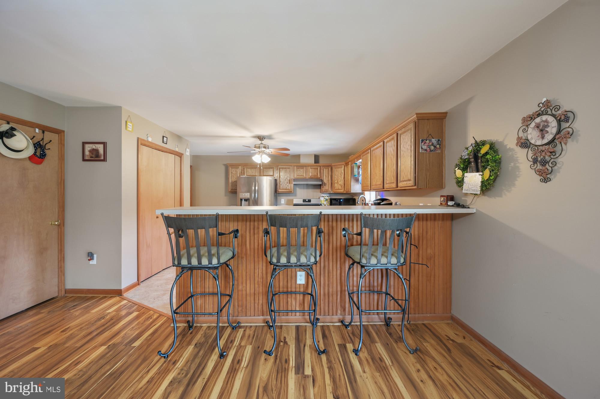 480 Hemping Road Harrington, DE 19952 - Photo 22 of 40 a dining room with furniture and wooden floor