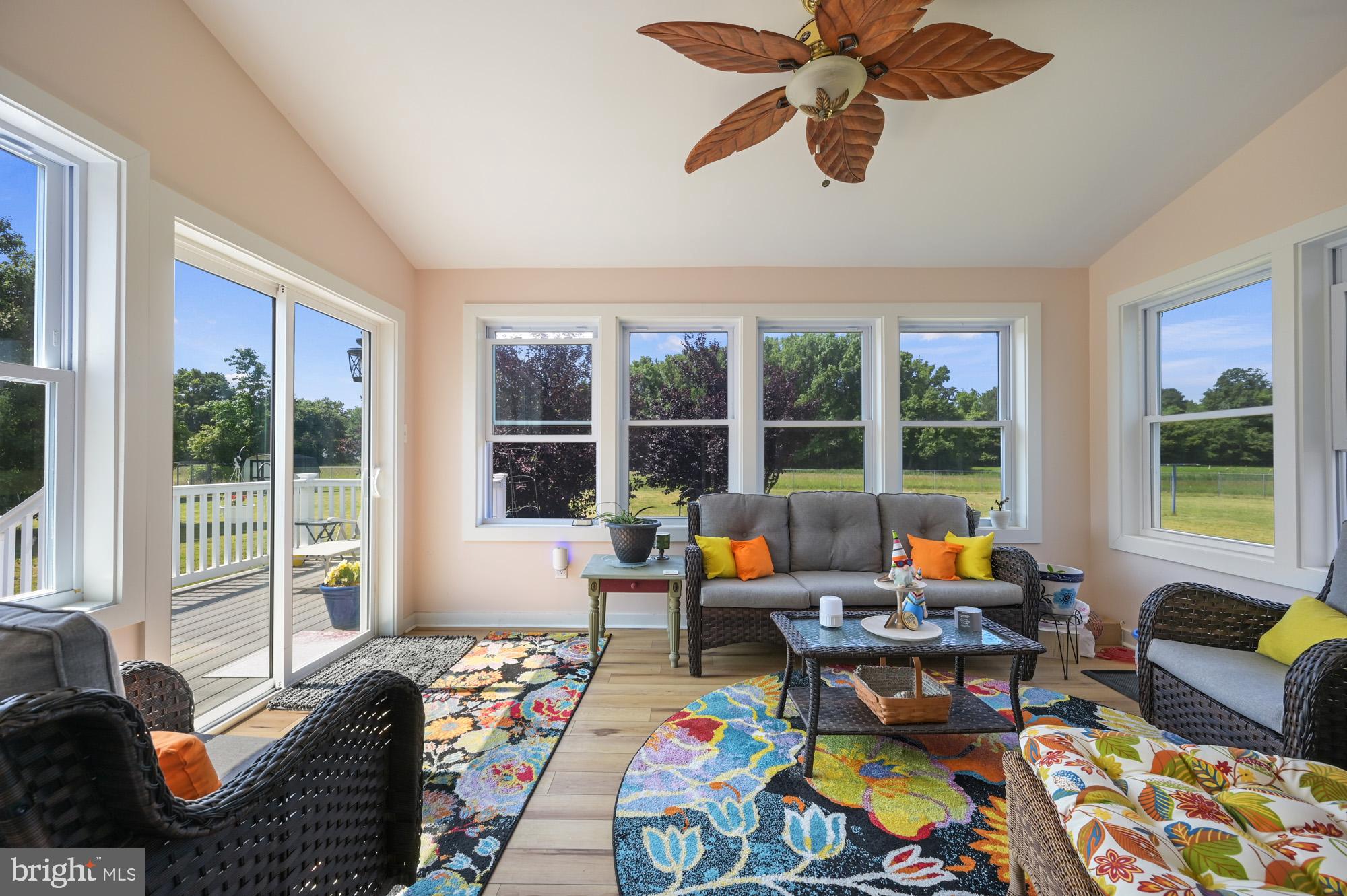 480 Hemping Road Harrington, DE 19952 - Photo 27 of 40 a living room filled with furniture and a large window
