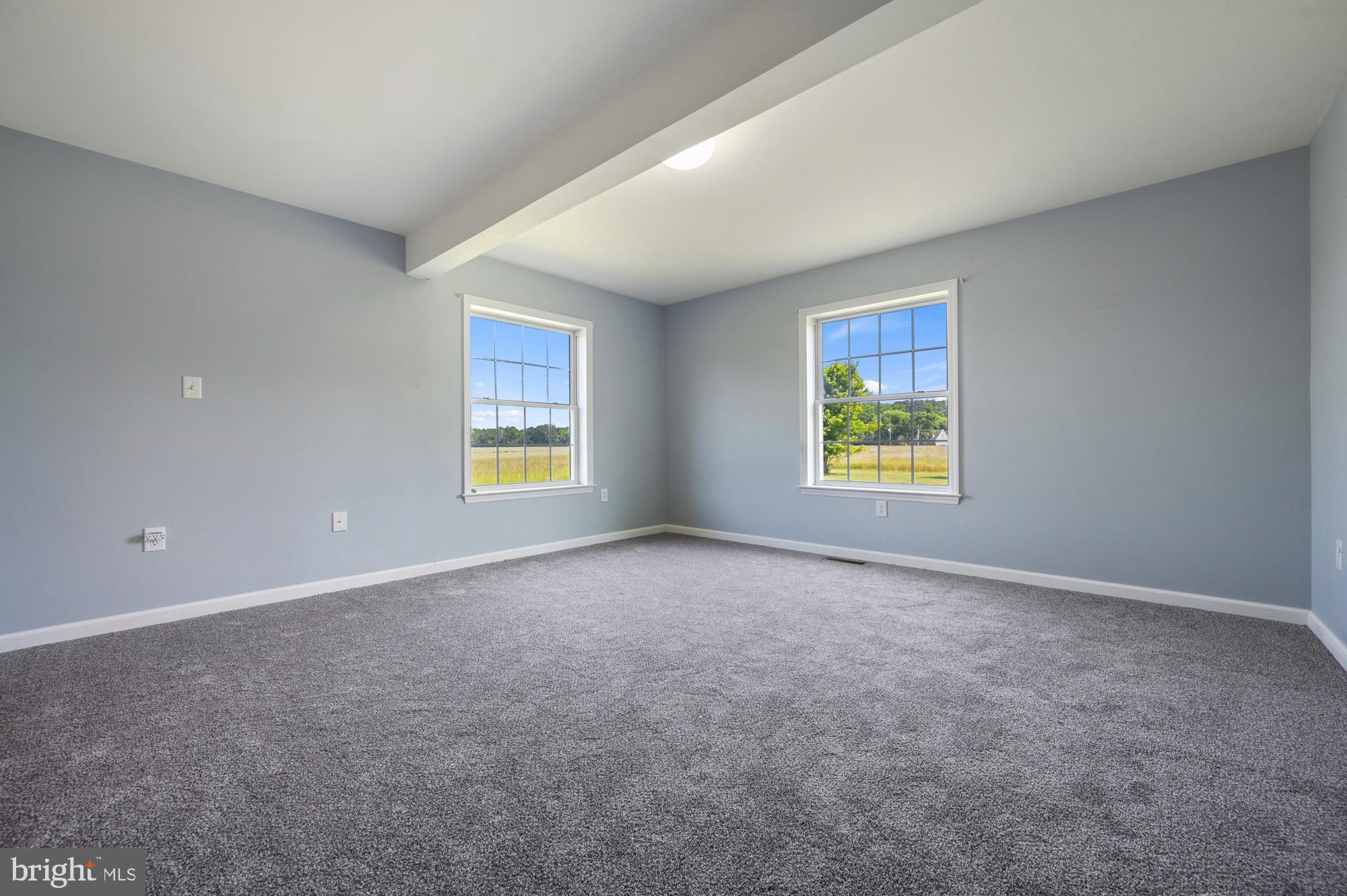 480 Hemping Road Harrington, DE 19952 - Photo 35 of 40 an empty room with windows and mirror
