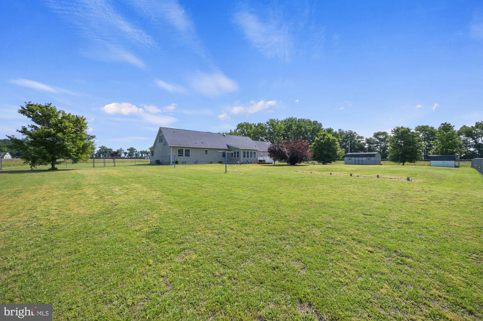 480 Hemping Road Harrington, DE 19952 - Photo 5 of 40 a view of a large green field