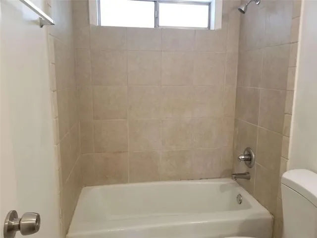 a bathroom with a bathtub