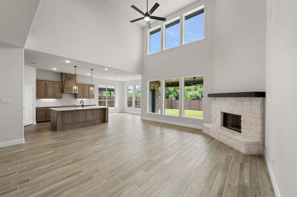 705 Seahawk Street Joshua, TX 76058 - Photo 9 of 28 DFW-Mockingbird Hills-Concept 3473-705 Seahawk Street-Living Room-Risewell Homes-2