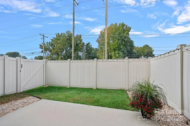a view of a backyard with plants