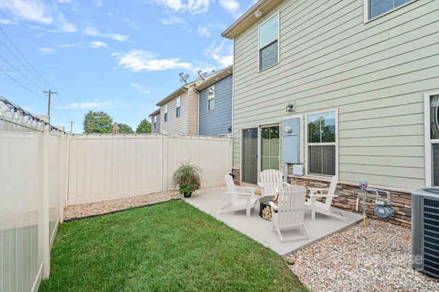 a view of swimming pool with outdoor seating