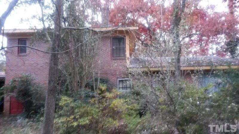 2322 Wade Avenue Raleigh, NC 27607 - Photo 3 of 9 a view of a house with a yard
