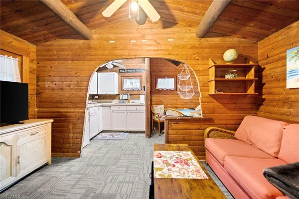 a picture of a couch in the balcony