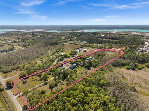 an aerial view of beach and city