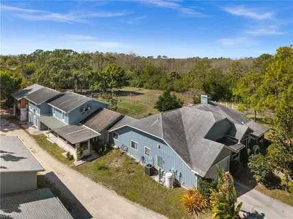 an aerial view of a house with a garden