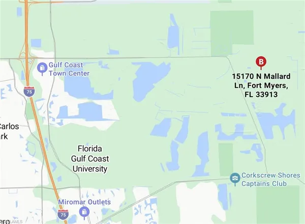 a picture of a book and a white bed