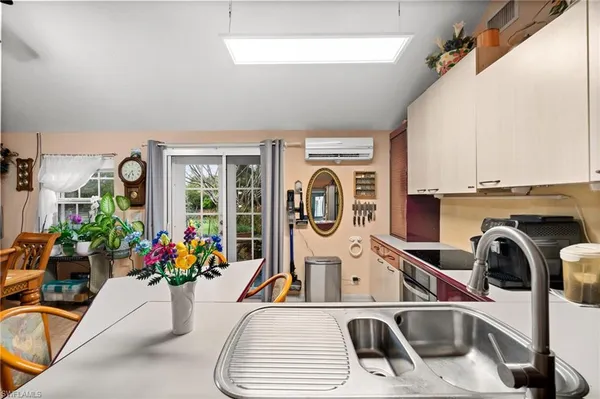 a room with furniture and a view of living room