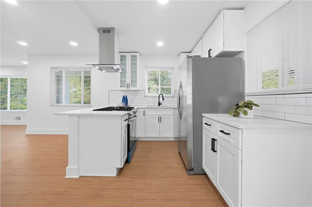 2118 Glendale Drive Decatur, GA 30032 - Photo 9 of 23 a kitchen with white cabinets and white appliances