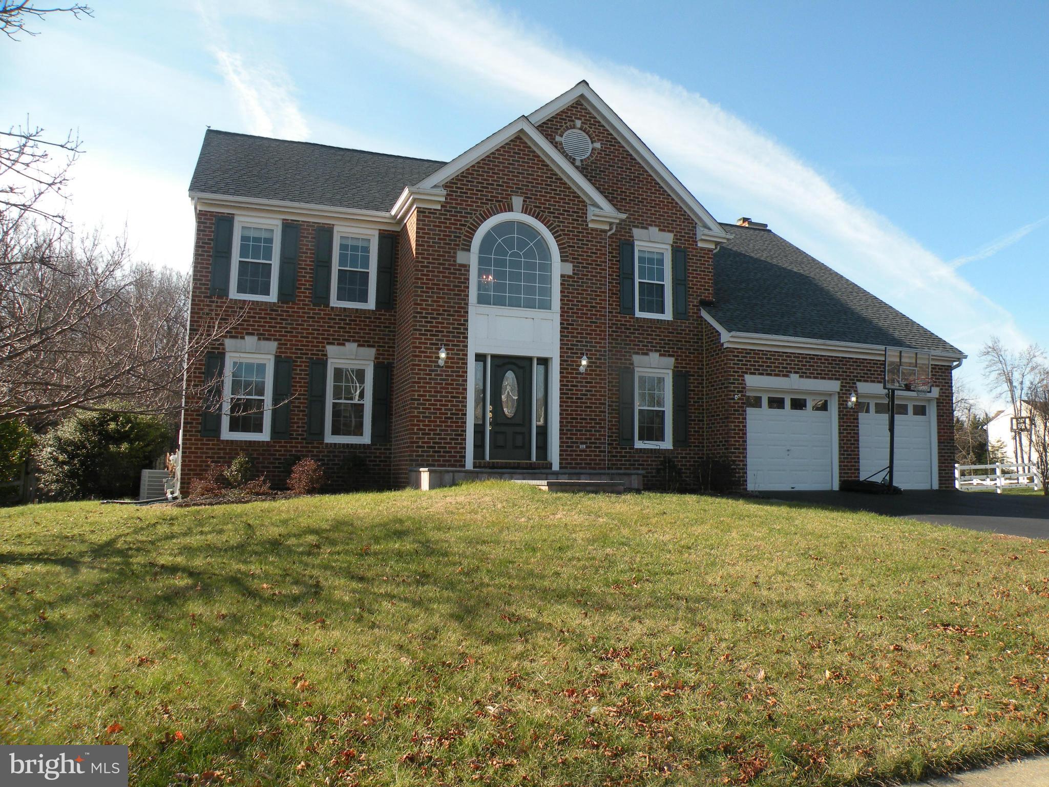3231 Breckenridge Way Riva, MD 21140 - Photo 1 of 30 a large house with a big yard and large trees