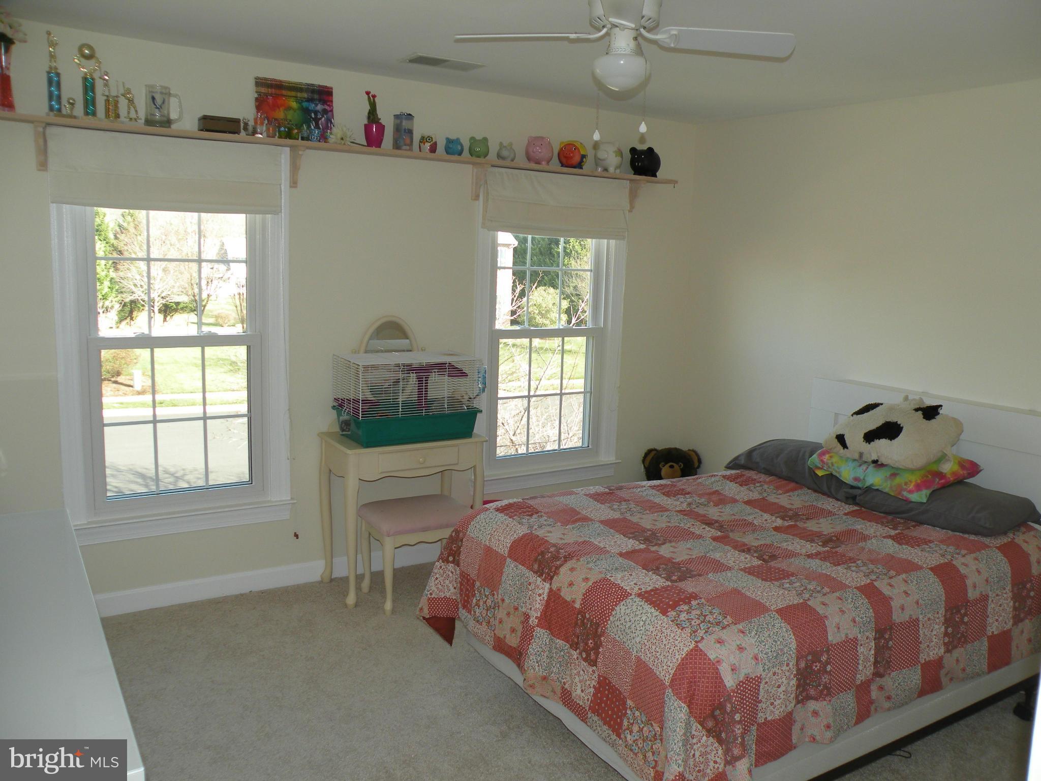 3231 Breckenridge Way Riva, MD 21140 - Photo 19 of 30 a bedroom with a bed and a window
