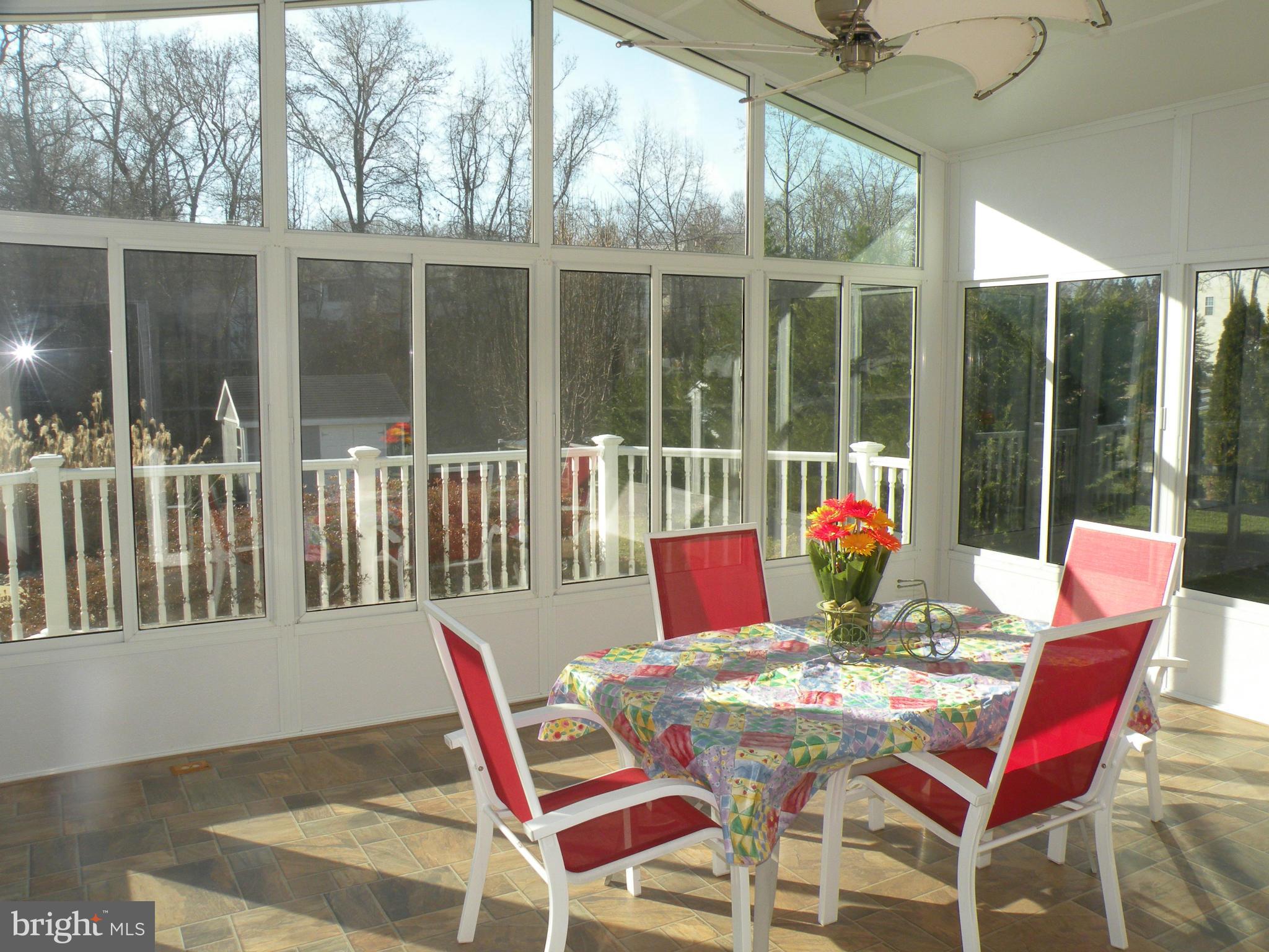 3231 Breckenridge Way Riva, MD 21140 - Photo 7 of 30 a view of a patio with a dining table and chairs