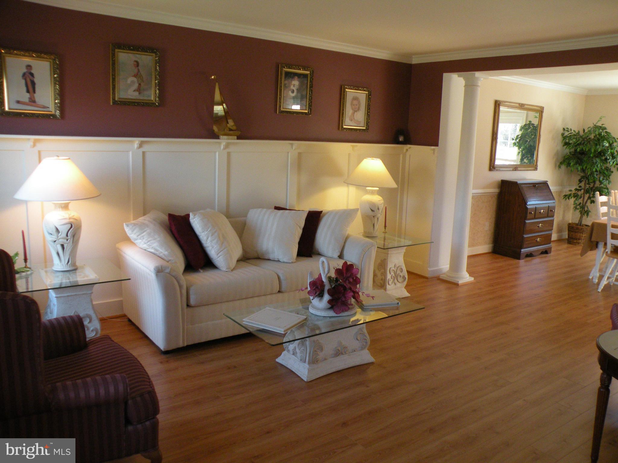 3231 Breckenridge Way Riva, MD 21140 - Photo 9 of 30 a living room with furniture and a lamp
