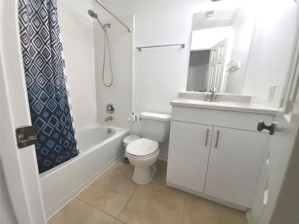 a view of a house with swimming pool and a yard