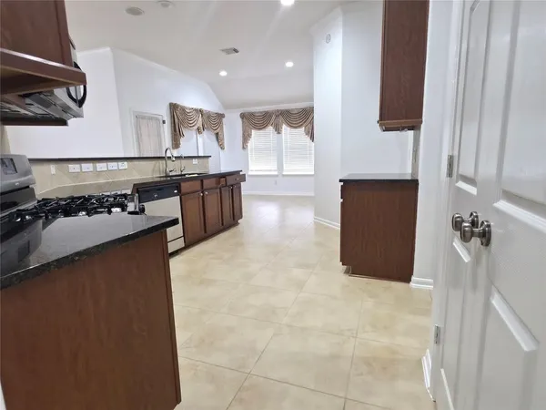 a view of a utility room with a sink