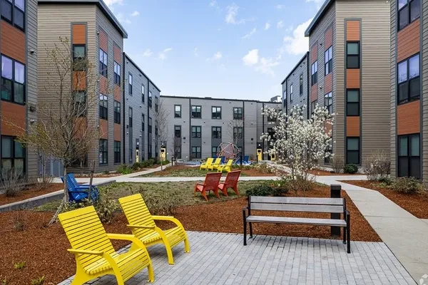 a view of a swimming pool with a lounge chairs