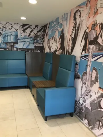 a living room with a couch and a stove