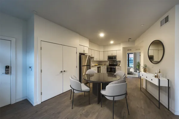 a view of a dining room with furniture