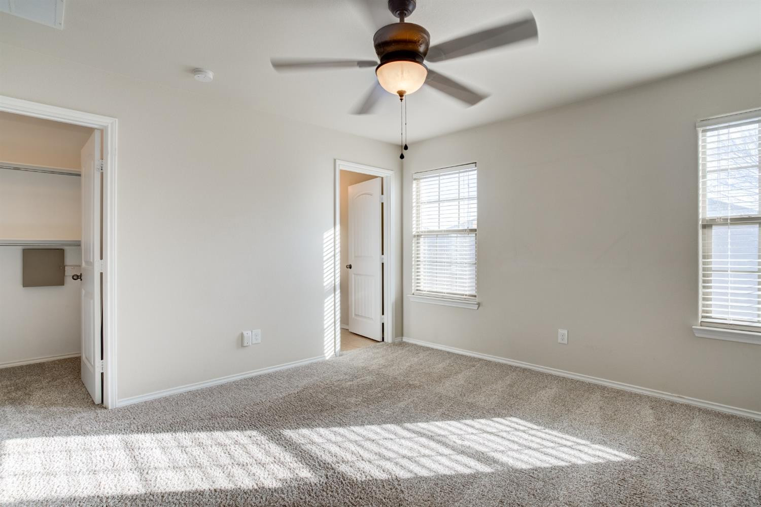 6921 95th Street Lubbock, TX 79424 - Photo 21 of 32 a view of an empty room with a window