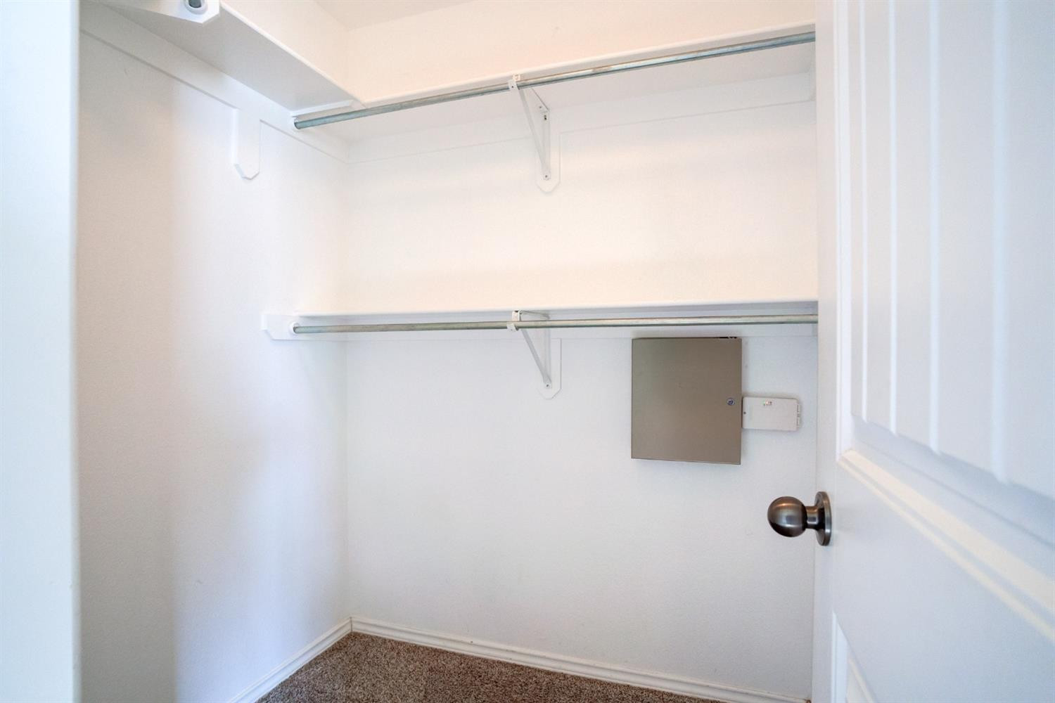 6921 95th Street Lubbock, TX 79424 - Photo 22 of 32 a view of a walk in closet