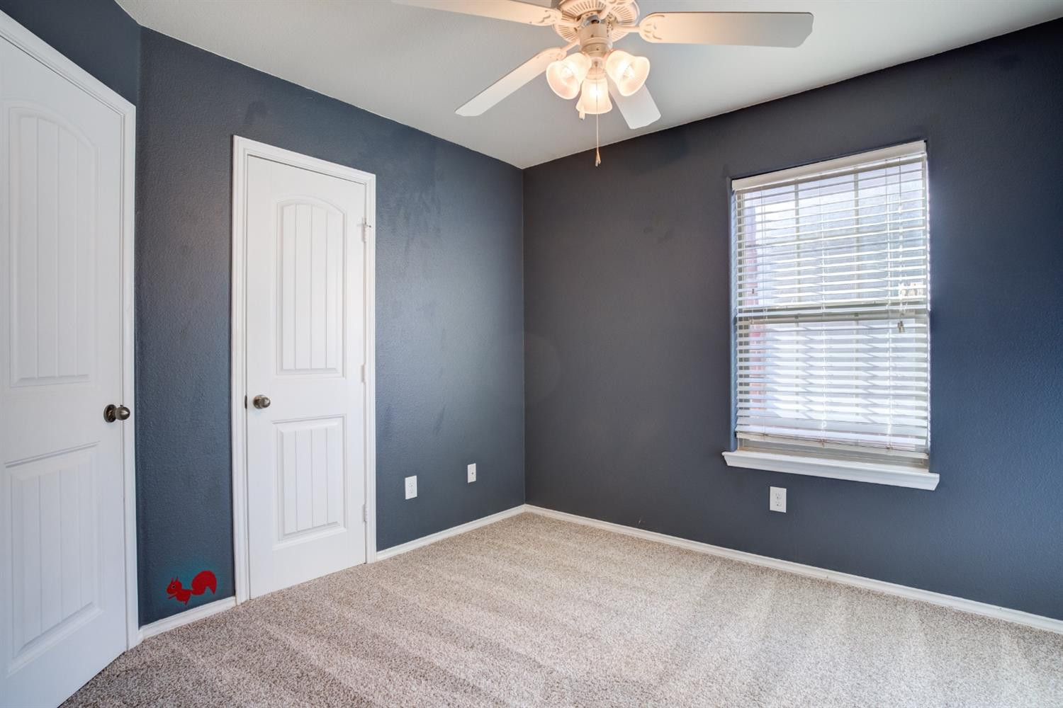 6921 95th Street Lubbock, TX 79424 - Photo 25 of 32 a view of an empty room with a window