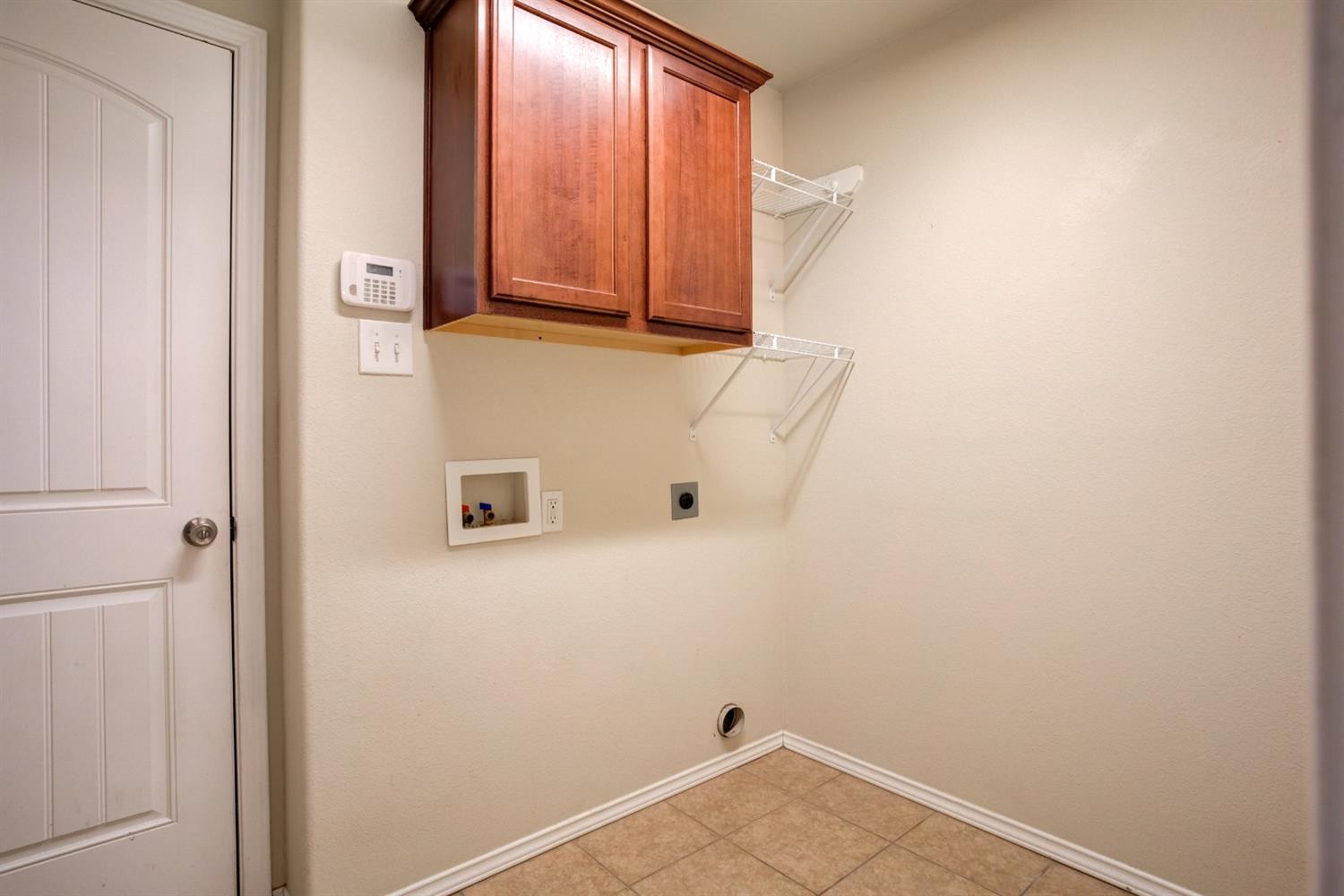 6921 95th Street Lubbock, TX 79424 - Photo 30 of 32 a view of utility room