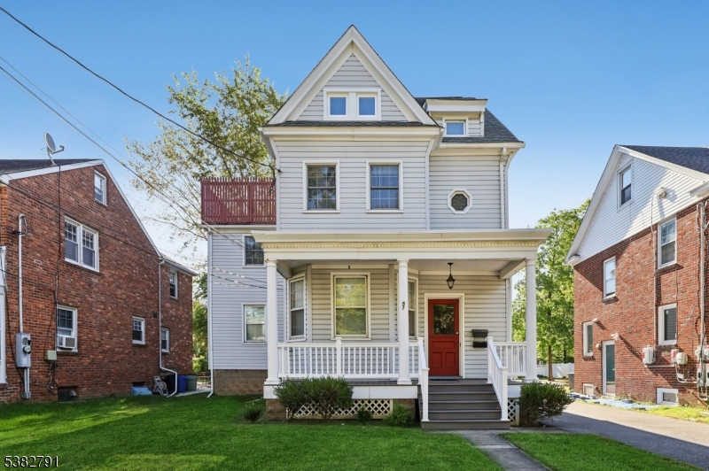 57 Greenwood Avenue Madison, NJ 07940 - Photo 1 of 30 front view of a house with a yard