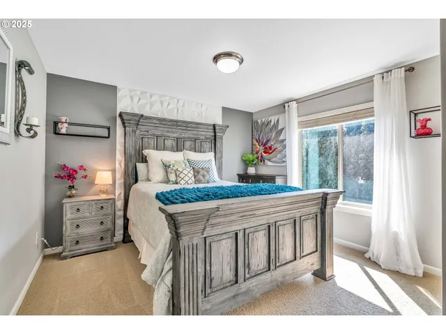 a kitchen with granite countertop a stove a sink and a refrigerator