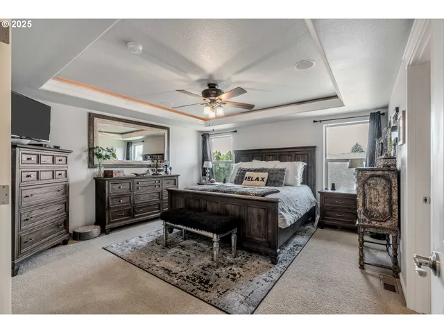 a bed room with a bed and furniture